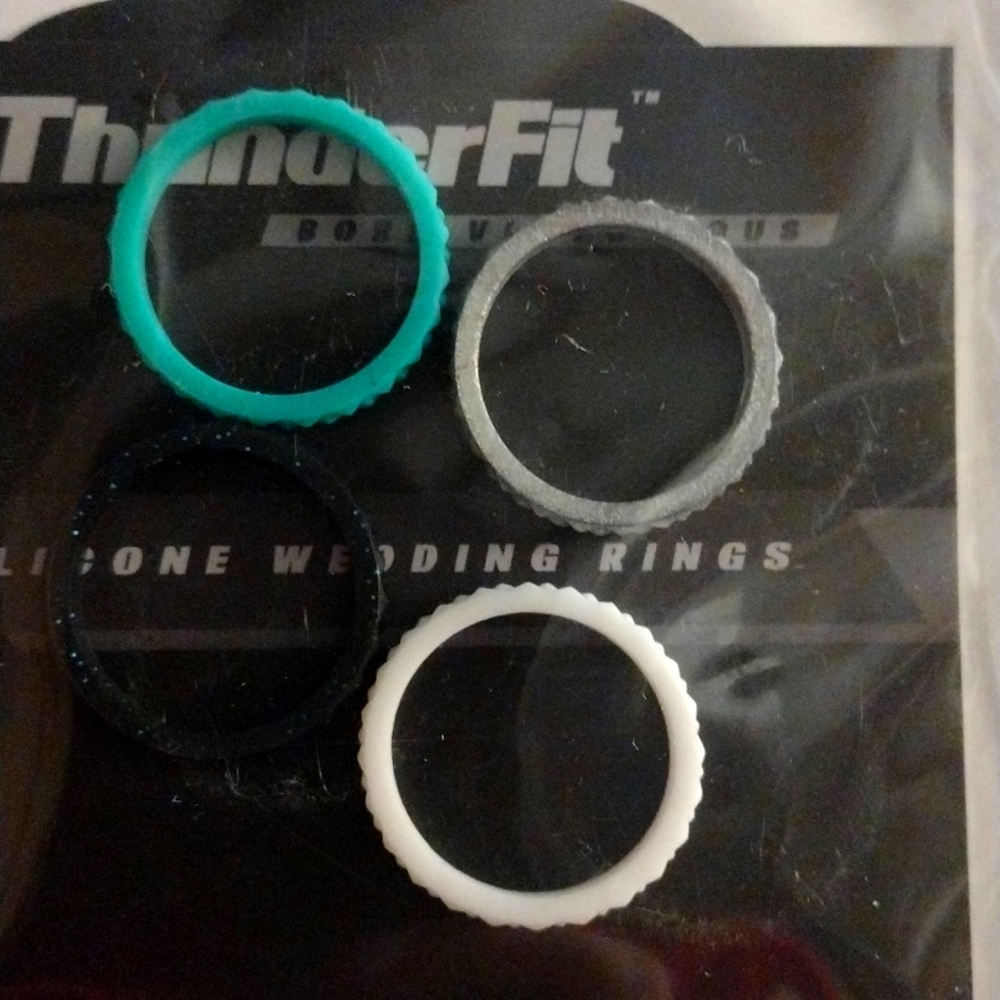 Stretchy 4 piece stackable silicone wedding ring pack aqua ivory charcoal ebony